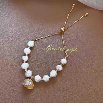Liuvelle Minimalist Baroque Pearl Bracelet with Shell Accents