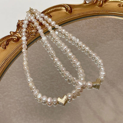 Liuvelle Baroque Pearl Necklace with Matte Gold Heart Pendant